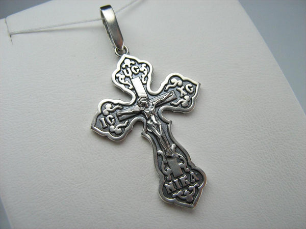 925 Sterling Silver Christian cross pendant and crucifix with Russian prayer inscription decorated with filigree and wood pattern on the oxidized background.