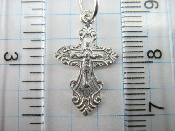 Cute and lovely solid 925 Sterling Silver tiny cross pendant for kids and children with Jesus Christ crucifix, Christian prayer inscription to God decorated with filigree and fleur de lis pattern.