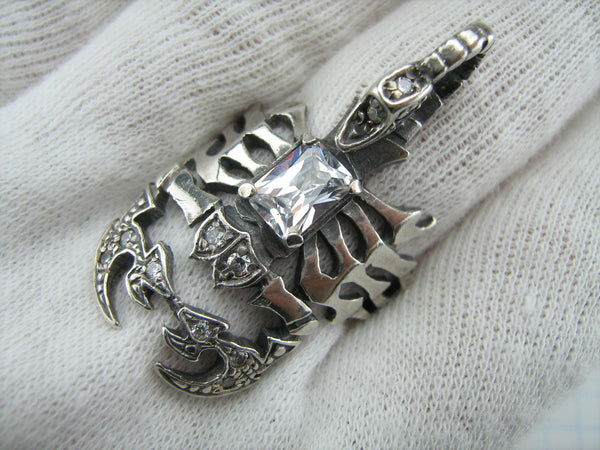 925 Sterling Silver oxidized scorpion pendant decorated with Cubic Zirconia stones. A good gift for scorpio zodiac birthday.