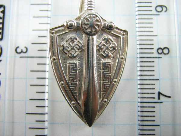 925 Sterling Silver large pendant shaped shield and sword decorated with Celtic knots and swastika pattern.