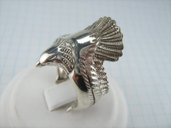 925 solid Sterling Silver ring of adjustable size depicting a bird with rare design and unique handmade details.