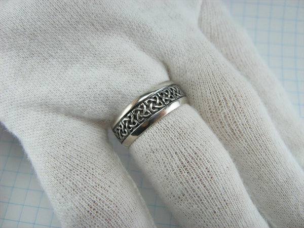 925 solid Sterling Silver band with Celtic knot openwork pattern.
