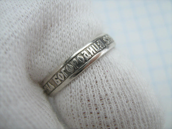 A narrow band with Christian prayer inscription to Mother of God made of solid 925 Sterling Silver.