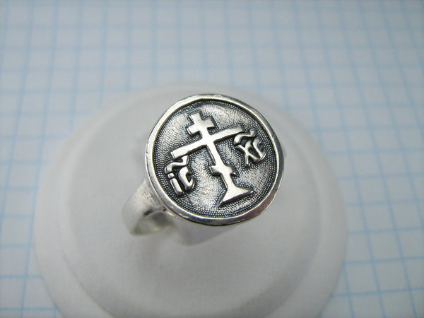 925 Sterling Silver band showing old believers cross on the oxidized background with Cyrillic inscription of Jesus Christ.