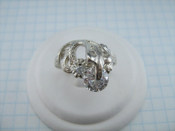925 solid Sterling Silver ring shaped cobra decorated with spinning round Cubic Zirconia stone.