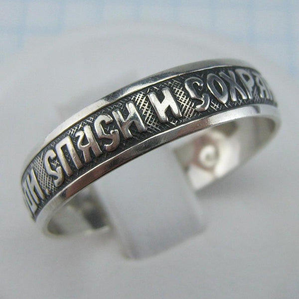 Vintage 925 Sterling Silver band with Christian prayer inscription to God on the oxidized background decorated with old believers cross.