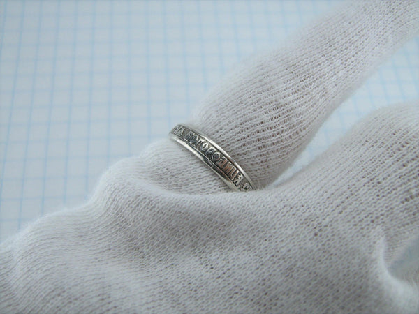 A narrow band with Christian prayer inscription to Mother of God made of solid 925 Sterling Silver.