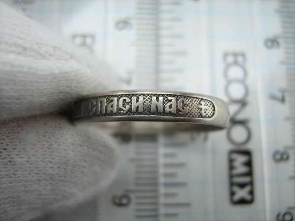 Real 925 solid Sterling Silver band with Christian prayer inscription to Mother of God Mary on the black oxidized background, faith and church jewelry.