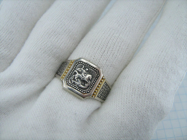 925 Sterling Silver and gold plated signet and wide band with Christian prayer inscription to Saint George and depicting the warrior fighting a dragon on the oxidized background with blessing prayer text.