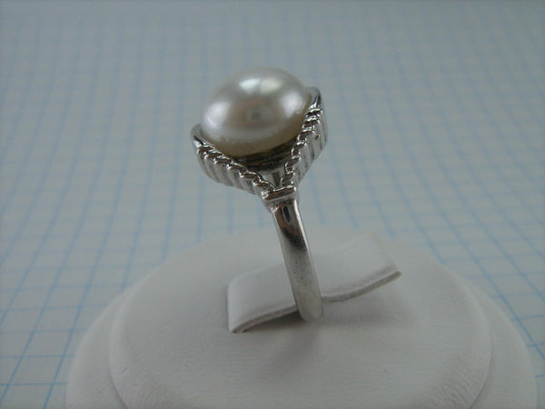 Pre-owned and estate 925 solid Sterling Silver ring with large genuine white freshwater pearl, round and button shaped.