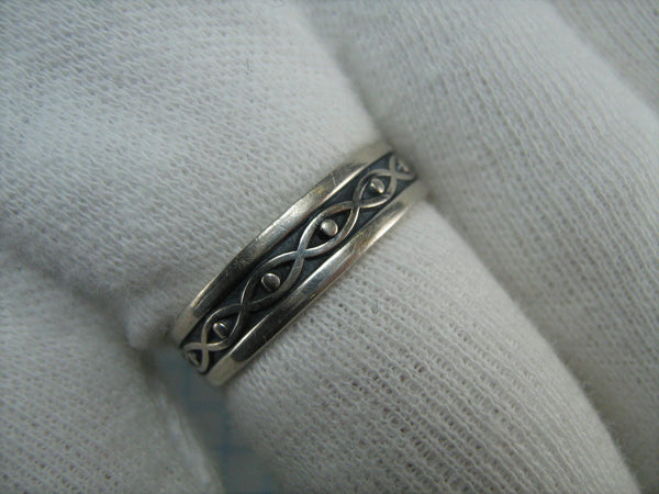 Pre-owned 925 solid Sterling Silver eternity and infinity ring with evil eye pattern on the oxidized band decorated with ribbons and dots