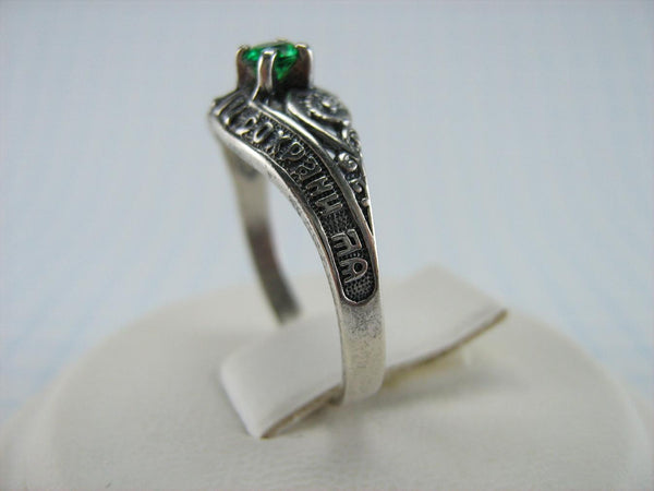 Vintage 925 Sterling Silver ring with Christian prayer inscription to God on the oxidized background decorated with green Cubic Zirconia stone.