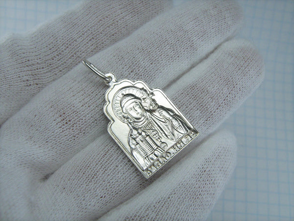 925 Sterling Silver detailed medal pendant depicting the icon of Saint Olga holding a cross and a church.