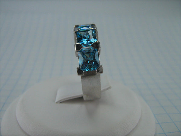 New 925 solid Sterling Silver band with 5 princess cut light blue square and rectangle Cubic Zirconia stones.