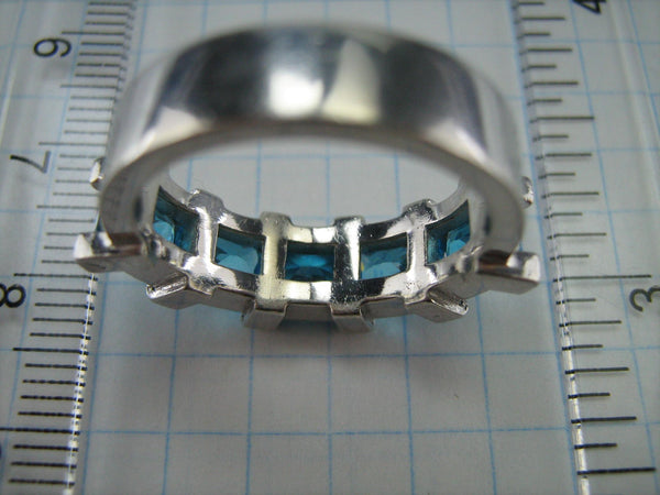 New 925 solid Sterling Silver band with 5 princess cut light blue square and rectangle Cubic Zirconia stones.