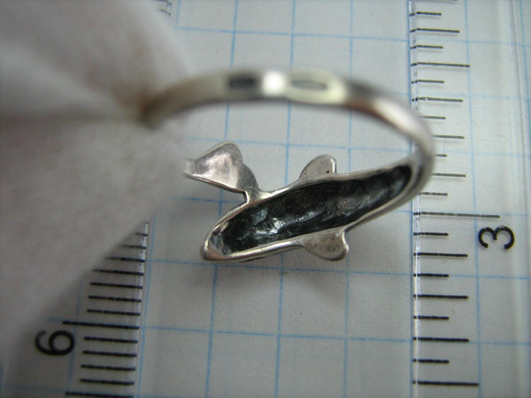 Pre-owned and estate 925 solid Sterling Silver band shaped dolphin. A nice daily precious accessory with manual work and oxidized finish.