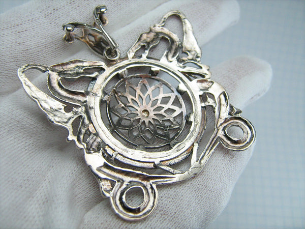 925 Sterling Silver pendant decorated with openwork oxidized dragons around the shield.