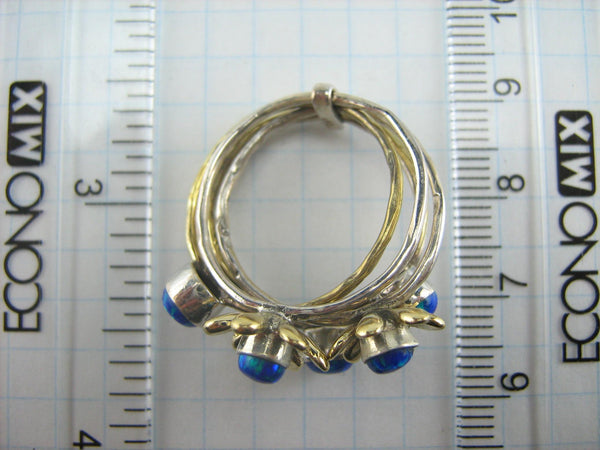 925 solid Sterling Silver band with small opal stones, designed as assembled multiple ring set.