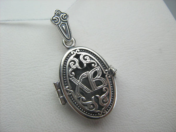 925 Sterling Silver oxidized locket, religious pendant and medal shaped Easter egg with Christian prayer inscription.