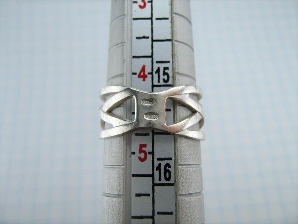 Pre-owned and estate 925 Sterling Silver wide band with openwork pattern. 