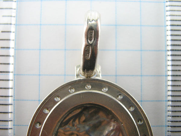 Vintage solid 925 Sterling Silver icon pendant and medal in oval frame depicting Mother of God Nursing Jesus Christ Child.