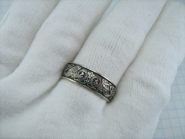 925 Sterling Silver engagement or wedding ring with Christian prayer inscriptions outside and inside the band on the oxidized background.