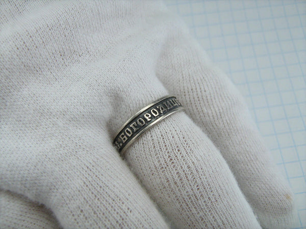925 Sterling Silver band with Christian prayer inscription to Mother of God on the oxidized background.