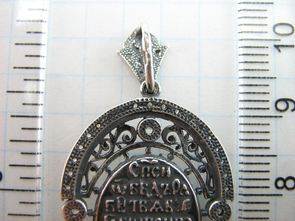 925 Sterling Silver pendant and medal in filigree frame depicting Seven Arrows icon of Mother of God and prayer to the Softener of Evil Hearts.