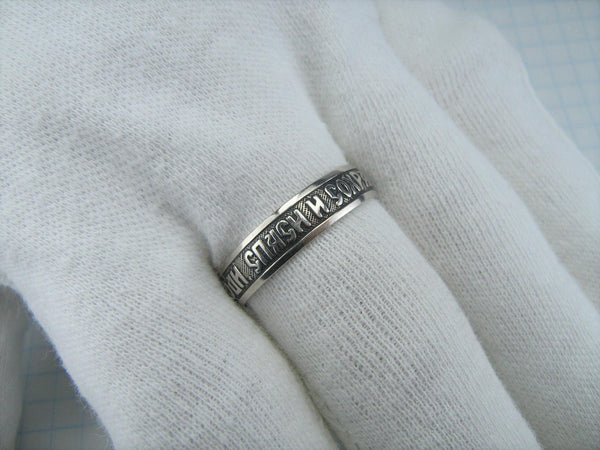 Vintage 925 Sterling Silver band with Christian prayer inscription to God on the oxidized background decorated with old believers cross.