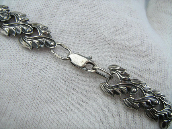 925 solid Sterling Silver bracelet with leaf pattern decorated with manual work and oxidized finish.