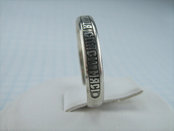 925 Sterling Silver narrow band with Christian prayer inscription to Mother of God on the oxidized background.