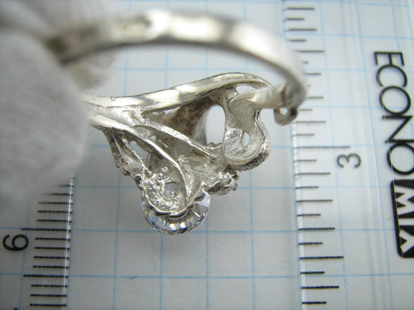 925 solid Sterling Silver ring shaped cobra decorated with spinning round Cubic Zirconia stone.