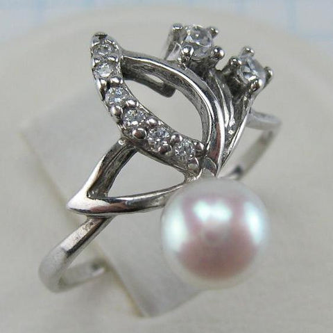925 solid Sterling Silver ring with pinkish white freshwater pearl and plant openwork pattern.