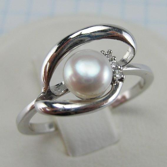 925 solid Sterling Silver ring with pinkish white freshwater pearl and openwork decoration.