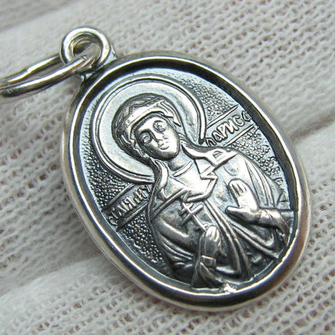 925 Sterling Silver small oval oxidized icon pendant and medal with prayer inscription to Saint Martyr Larissa holding a Christian cross.