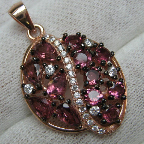 925 Sterling Silver small pendant with purple and pink color rubelite tourmaline and white Cubic Zirconia stones.