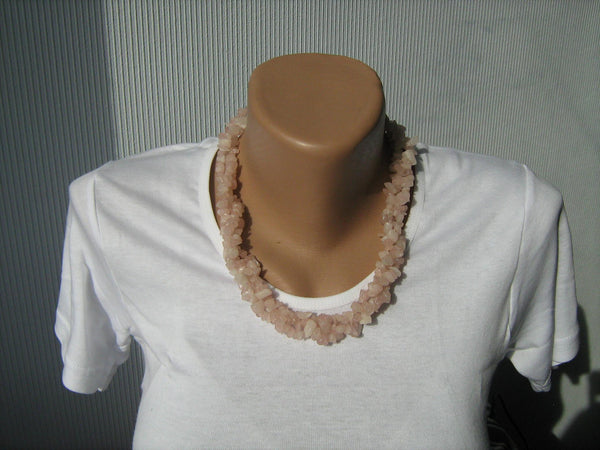 New natural pink quartz multistrand necklace with adjustable length.