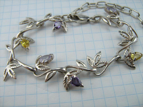 925 solid Sterling Silver bracelet with leaf pattern decorated with manual work and multicolor Cubic Zirconia stones.