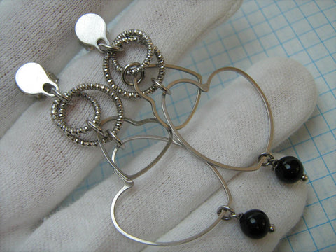 New 925 solid Sterling Silver long dangling earrings with stud, post and push back closure decorated with black bead shaped ball stones and hearts shaped