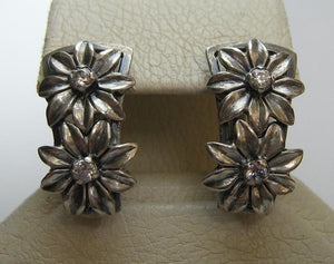 Pre-owned and estate 925 solid Sterling Silver earrings latch back snap closure with oxidized pattern and decorated with Cubic Zirconia stones shaped flowers with petals
