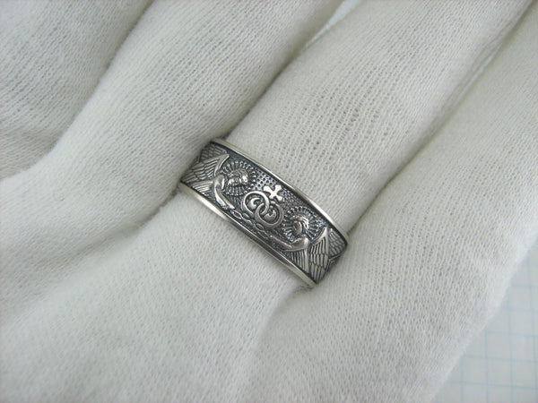 925 Sterling Silver engagement or wedding ring with Christian prayer inscriptions outside and inside the band on the oxidized background.