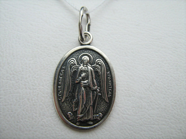 Solid 925 Sterling Silver small medal depicting Saint Angel the Guardian with Christian prayer inscription.