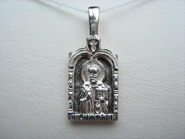 Solid 925 Sterling Silver icon pendant and medal depicting Saint Nicholas the Wonderworker decorated with prayer scripture.