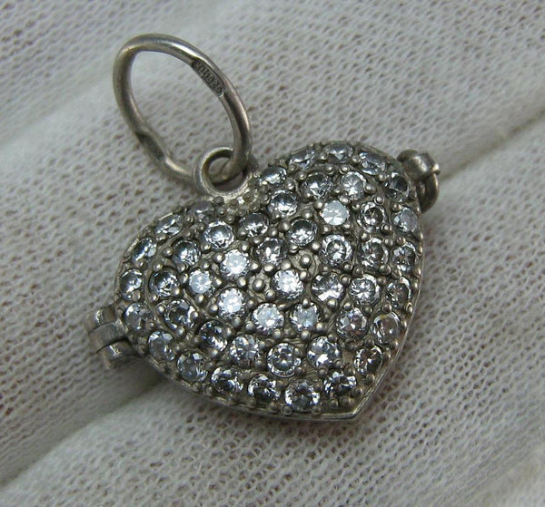 Vintage solid 925 Sterling Silver locket shaped heart decorated with Cubic Zirconia stones. An excellent gift for Saint Valentine’s Day to a beloved person.