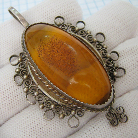 Vintage Russian USSR solid 875 and 925 Sterling Silver large pendant with real Baltic amber cabochon decorated with filigree and openwork pattern
