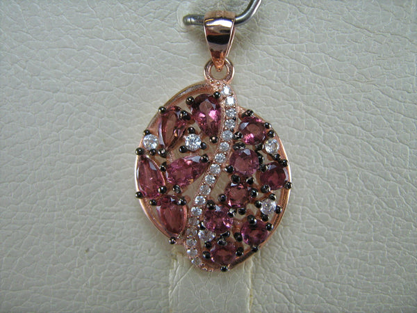925 Sterling Silver small pendant with purple and pink color rubelite tourmaline and white Cubic Zirconia stones.