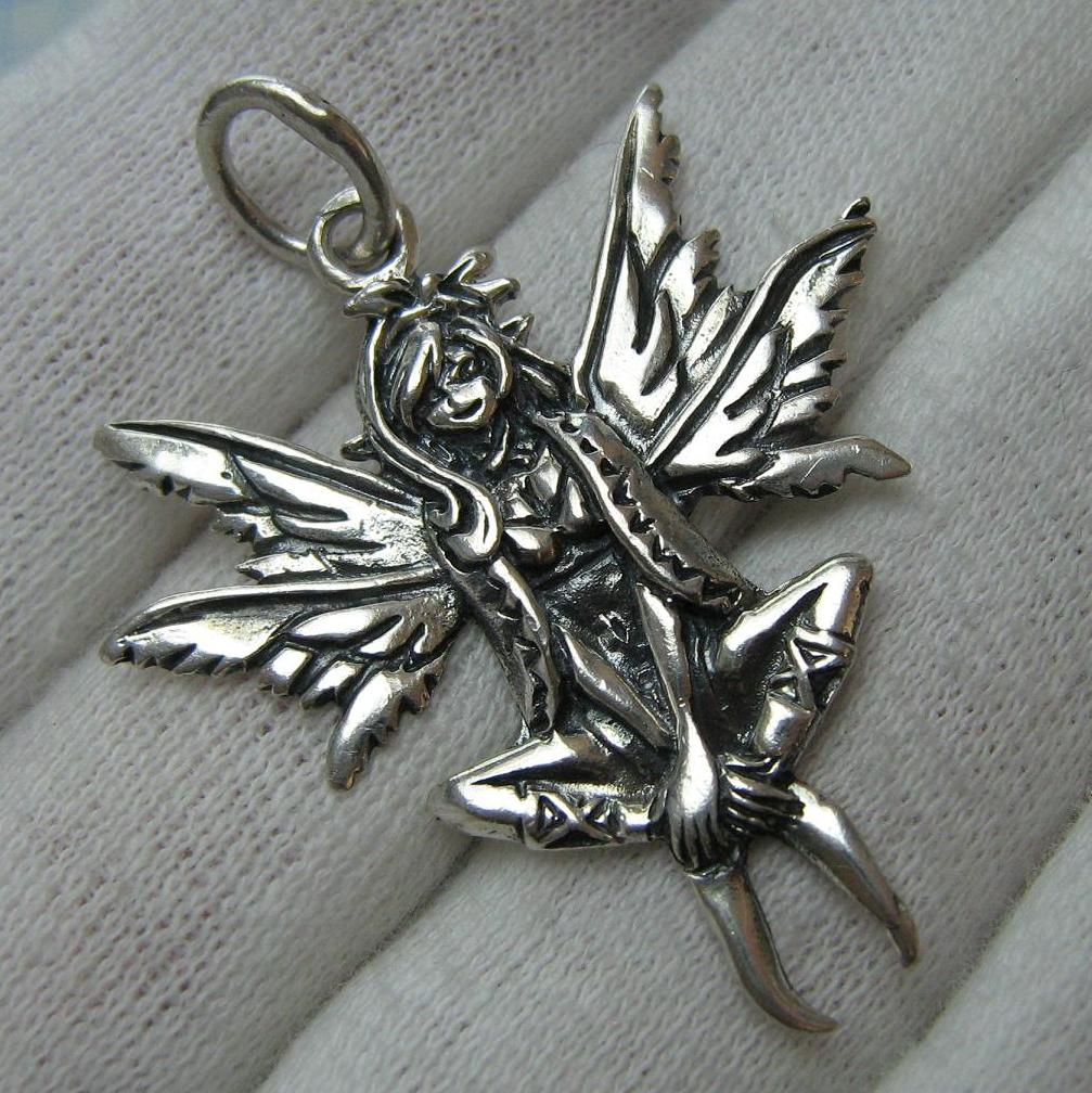 Vintage solid 925 Sterling Silver pendant depicting winx fairy or elf with wings decorated with detailed oxidized manual work
