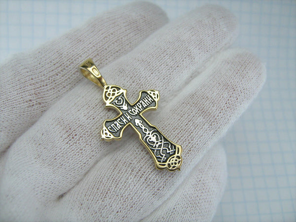 Vintage solid 925 Sterling Silver and Gold plated oxidized cross pendant and crucifix with Christian prayer inscription to Jesus Christ decorated with plant, floral and filigree pattern, depicting a Chi Rho symbol, also called chrismon or christogram.